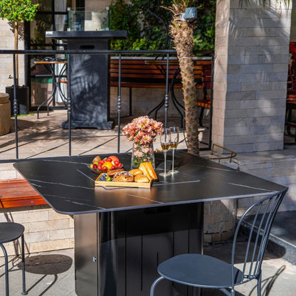 Elementi Plus Brugge Dining Fire Table with lid and snacks on top